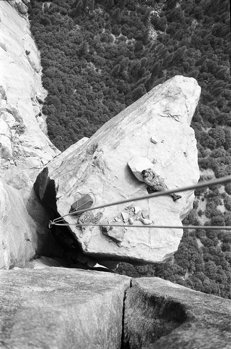 A climber relaxing on a ledge in Yosemite NP, California (High Angle Perspective, Historic Image).